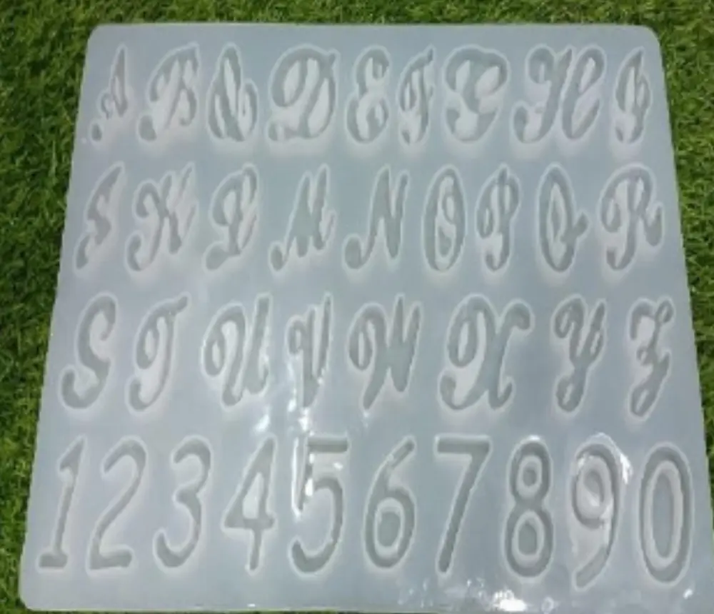 ALPHABET CURSIVE MOULD.